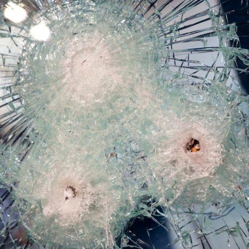 Was assassination carried out by remotecontrolled machine gun?